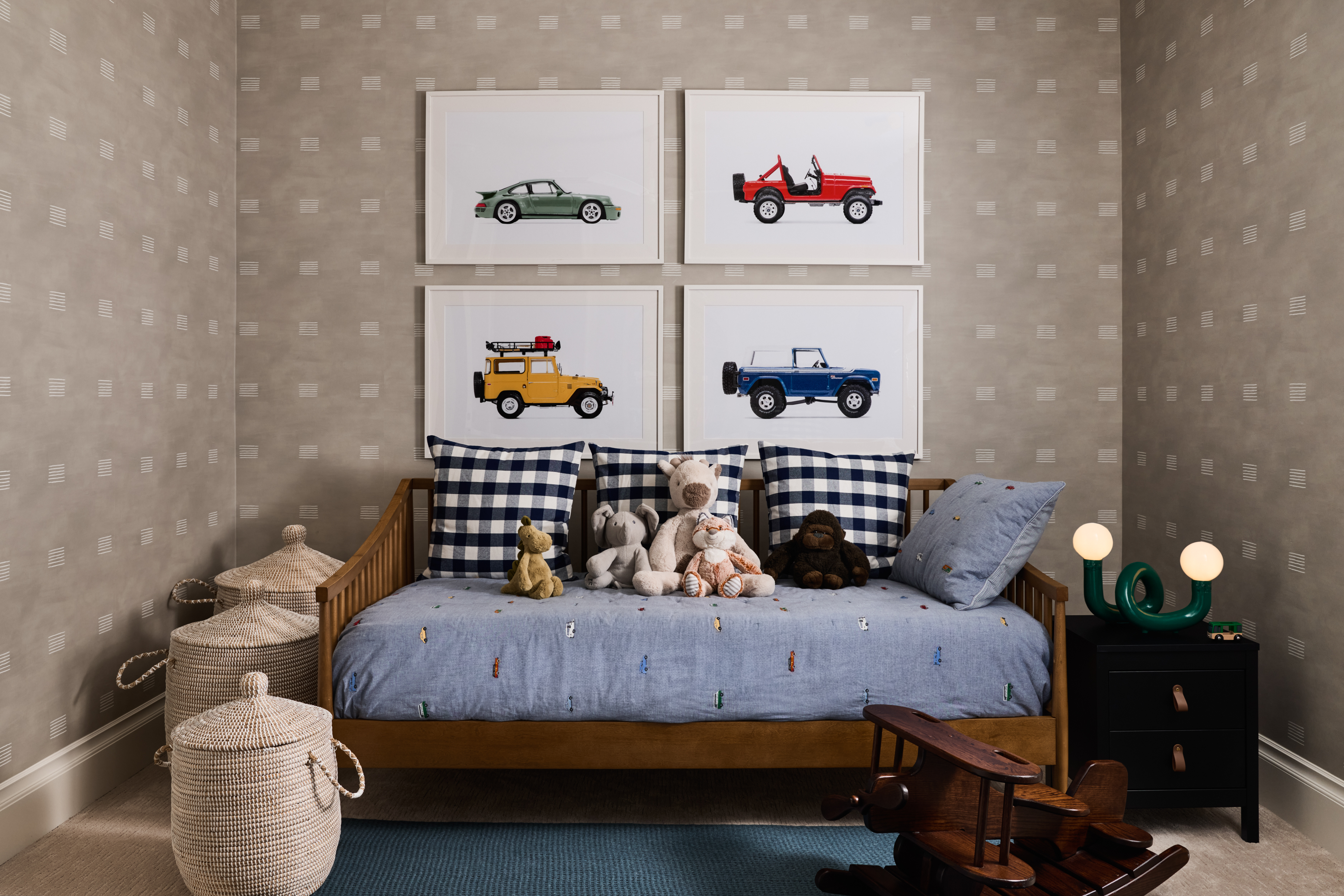 Child’s room with tailored daybed and collected artwork