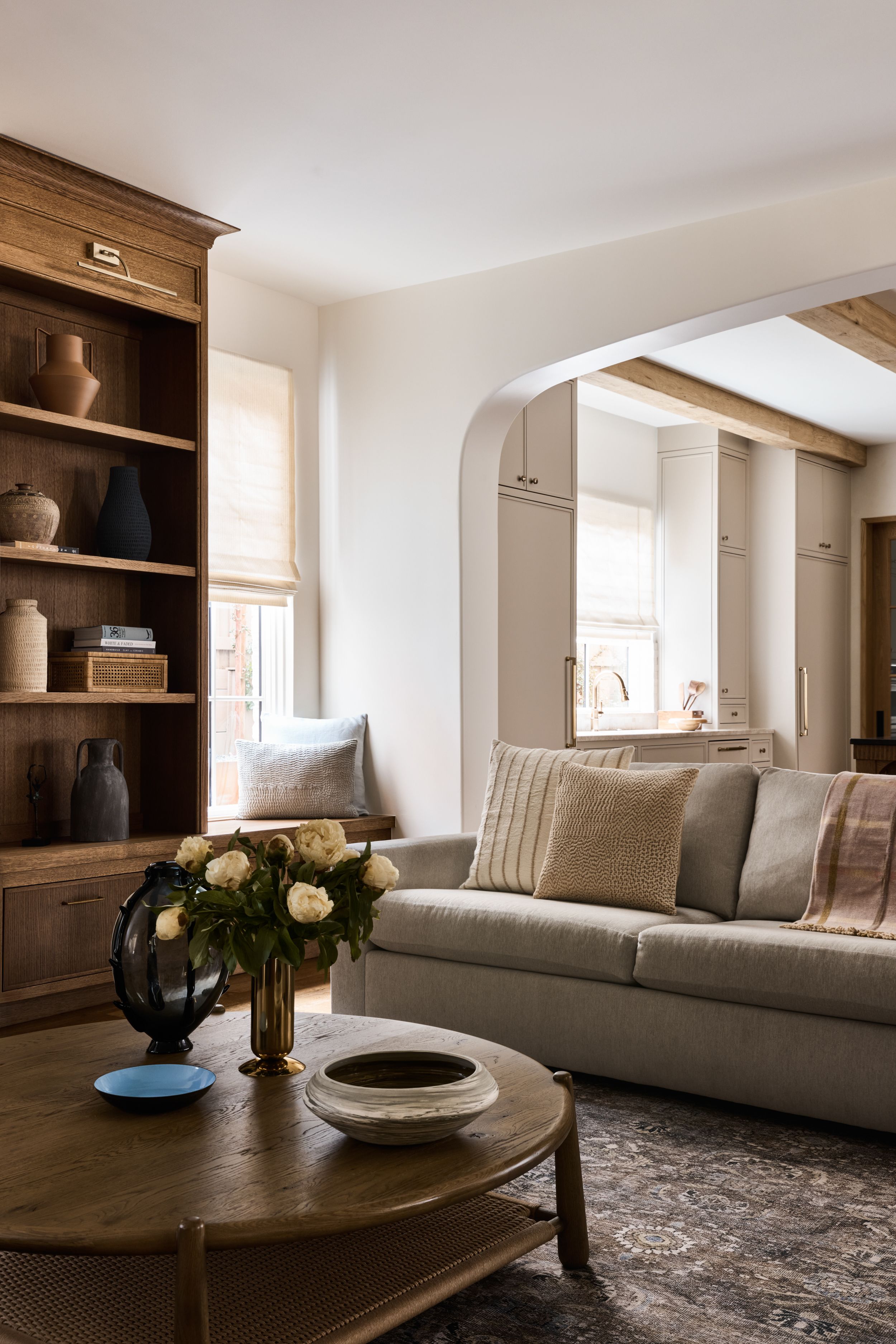 Living room view through a softly rounded opening