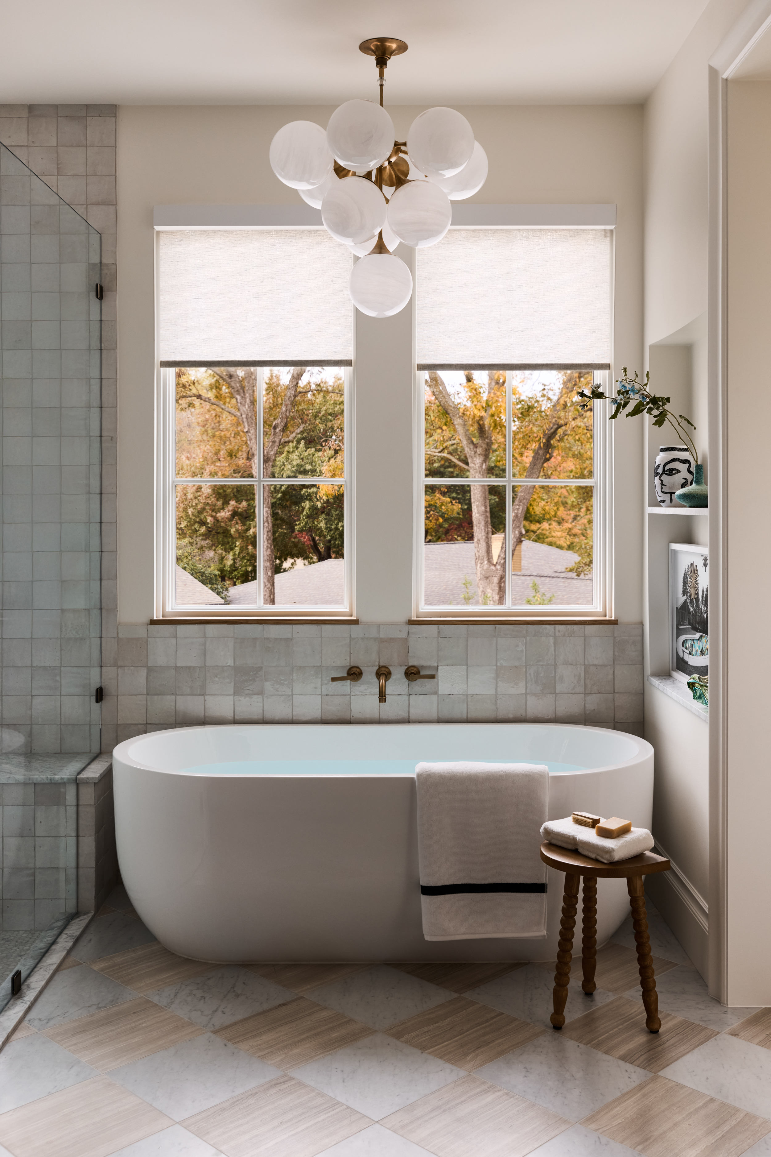 Primary bath with freestanding tub and handmade tile